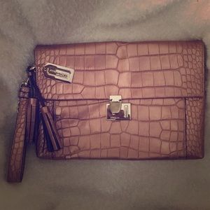 Rose Gold Roomy Coach Clutch.